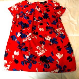 Short sleeve blouse orange w/ flowers